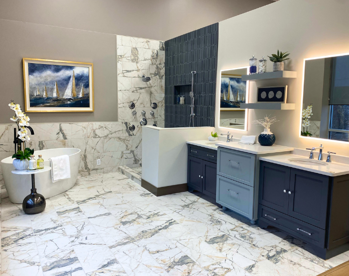 Blue vanity cabinets in a bathroom display